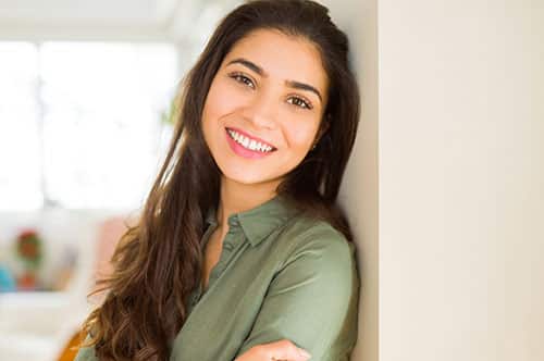 Beautiful Brunette Woman Smiling Cheerful Looking Happy And Positive With Crossed Arms.jpg